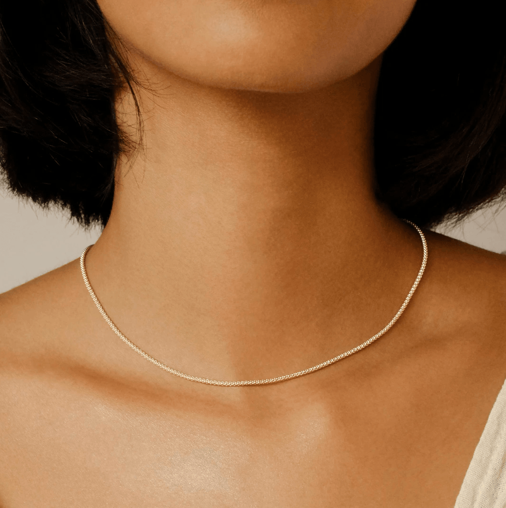 By Charlotte  Gold Divine Connection Choker available at Rose St Trading Co