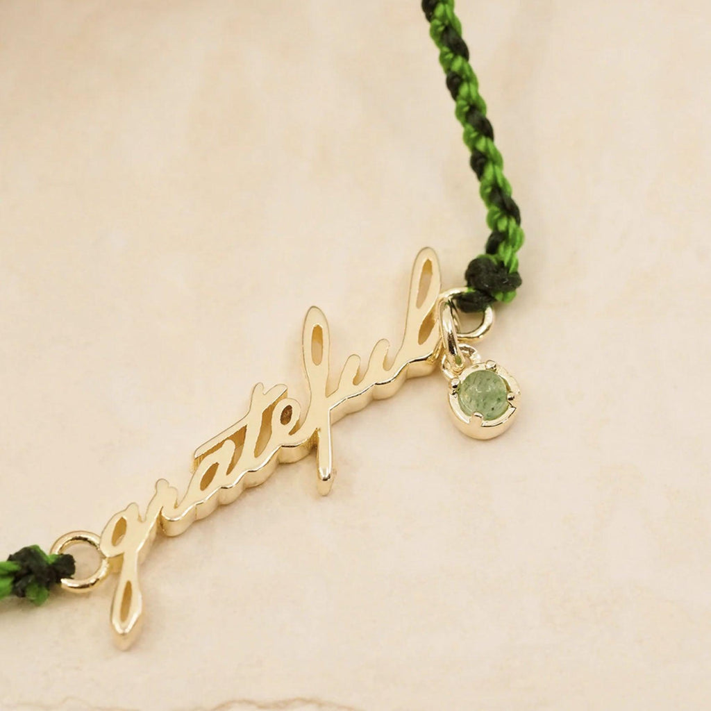 By Charlotte  Gold Grateful Cord Bracelet available at Rose St Trading Co