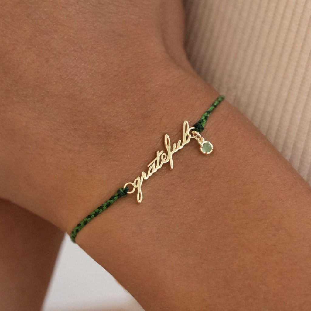 By Charlotte  Gold Grateful Cord Bracelet available at Rose St Trading Co