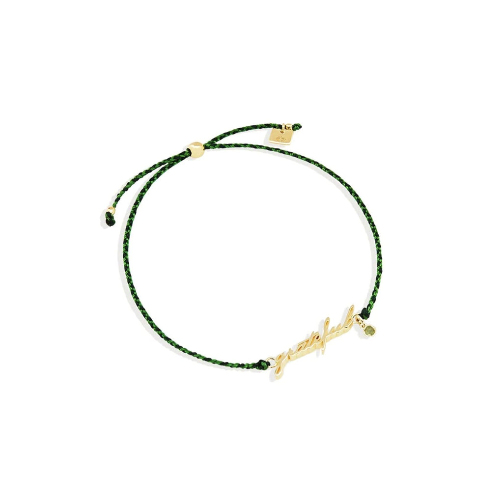 By Charlotte  Gold Grateful Cord Bracelet available at Rose St Trading Co