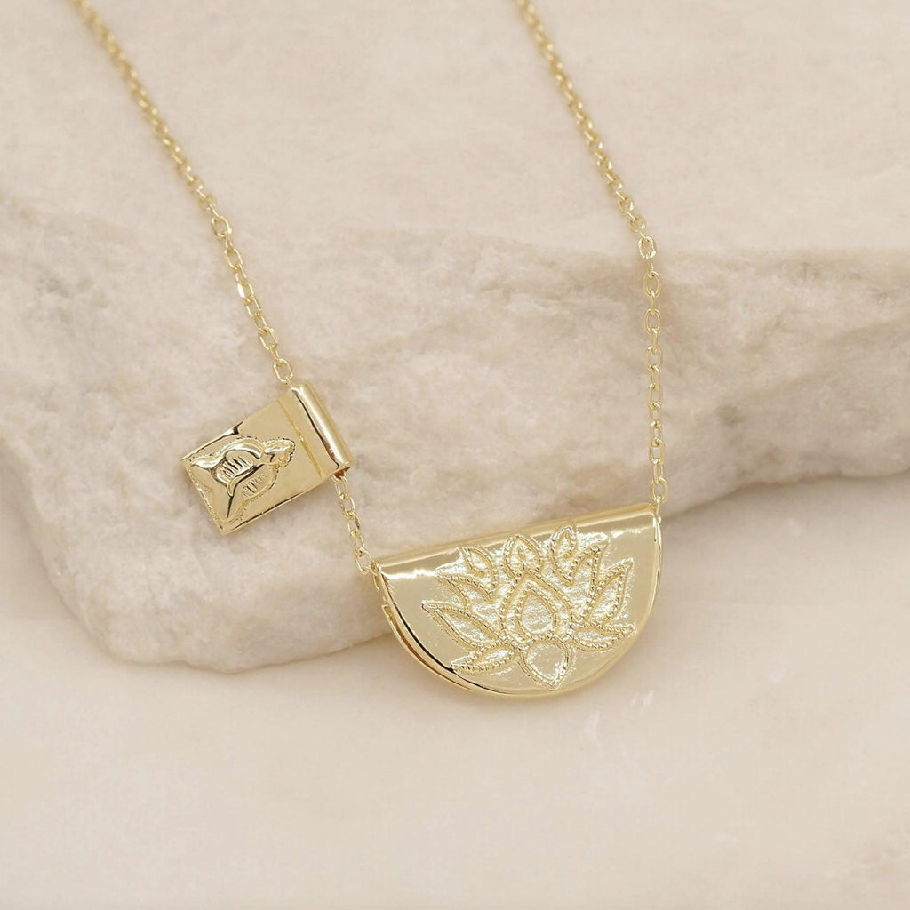 By Charlotte  Gold Lotus Little Buddha Necklace available at Rose St Trading Co