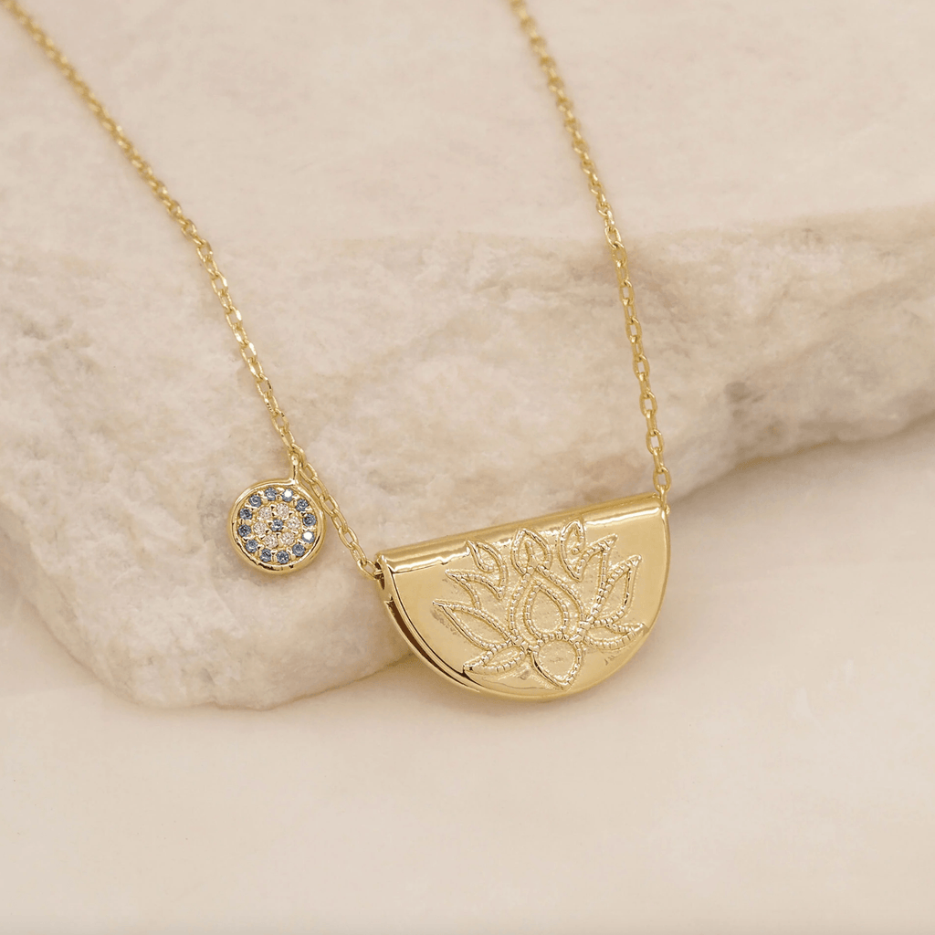 By Charlotte  Gold Lucky Lotus Necklace available at Rose St Trading Co