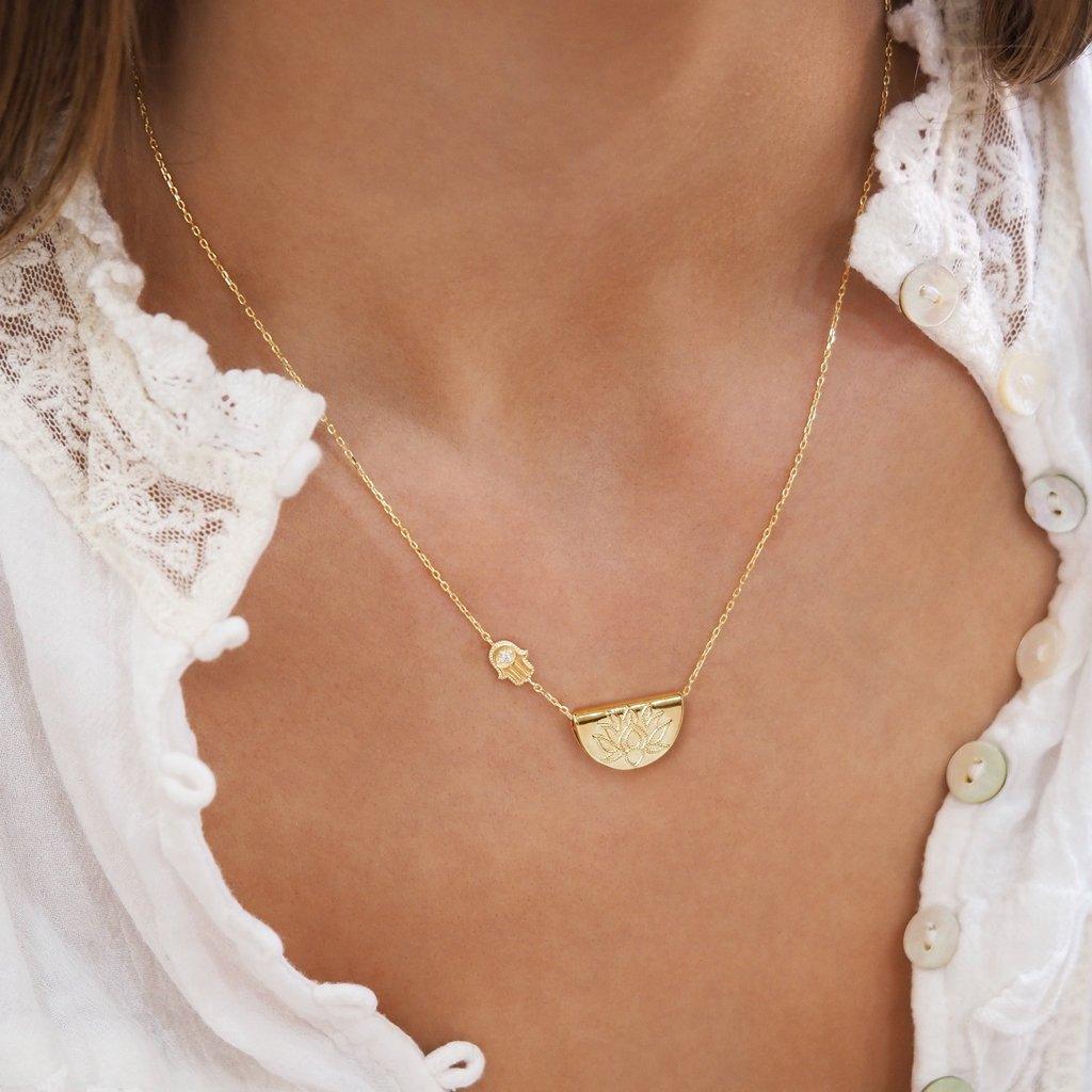 By Charlotte  Gold Sacred Guardian Necklace available at Rose St Trading Co