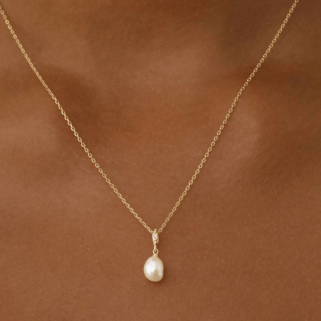 By Charlotte  Intention of Peace Pearl Pendant available at Rose St Trading Co