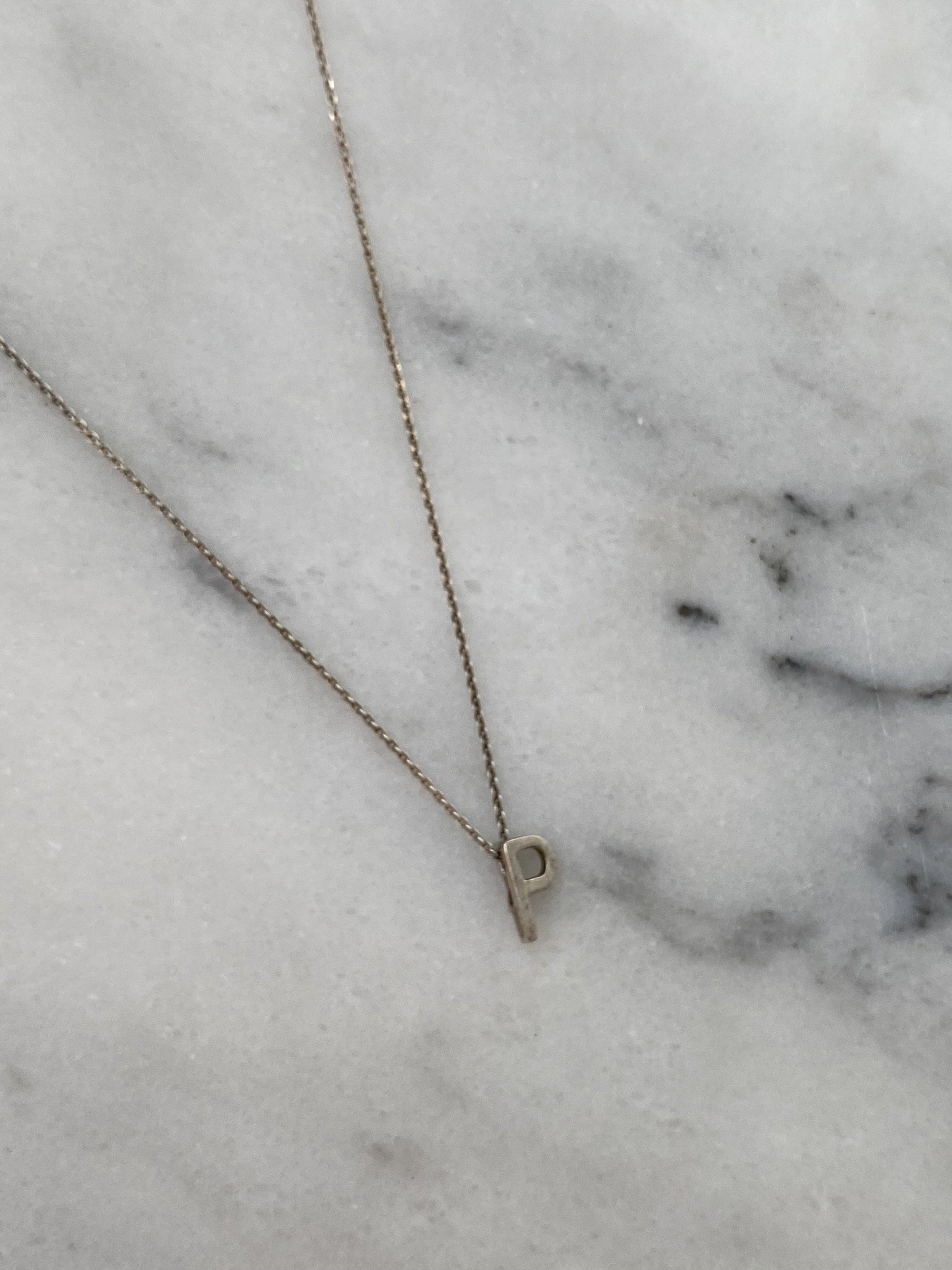 Linda Tahija  Letter Necklace Silver available at Rose St Trading Co