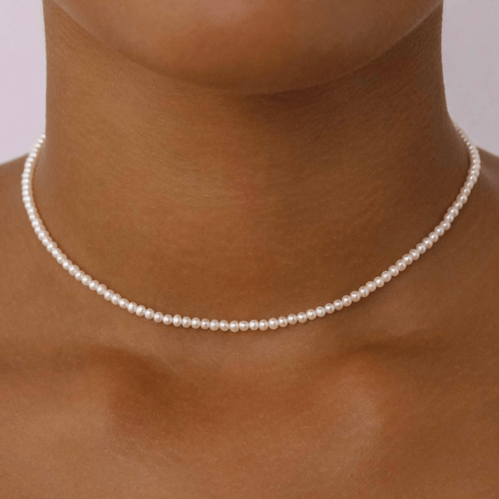 By Charlotte  Live In Peace Pearl Choker available at Rose St Trading Co