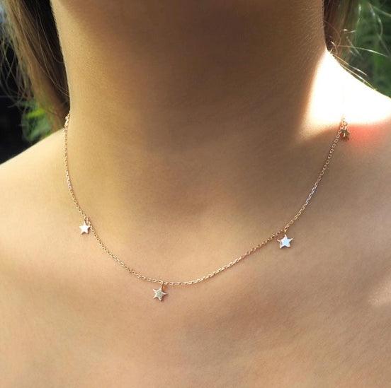 By Charlotte  Rose Gold Star Bright Necklace available at Rose St Trading Co